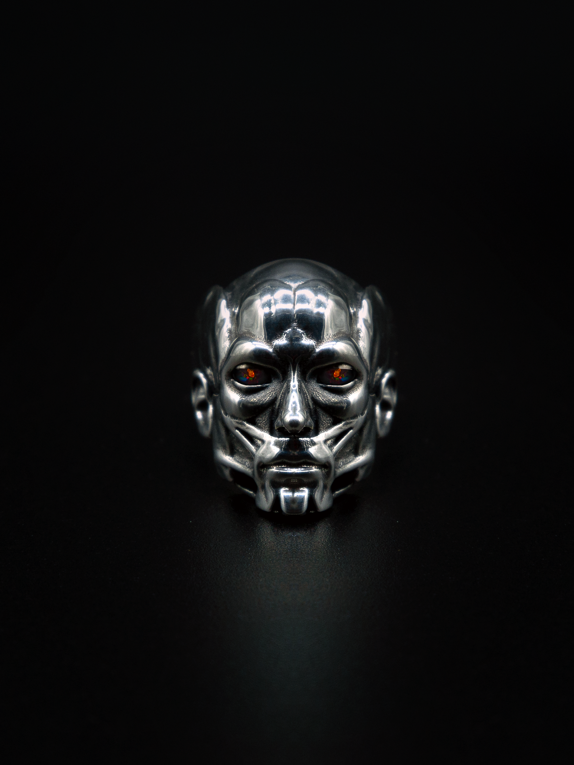 Accuser ring, mens and womens sculpture jewelry, black opals, and moving kinetic