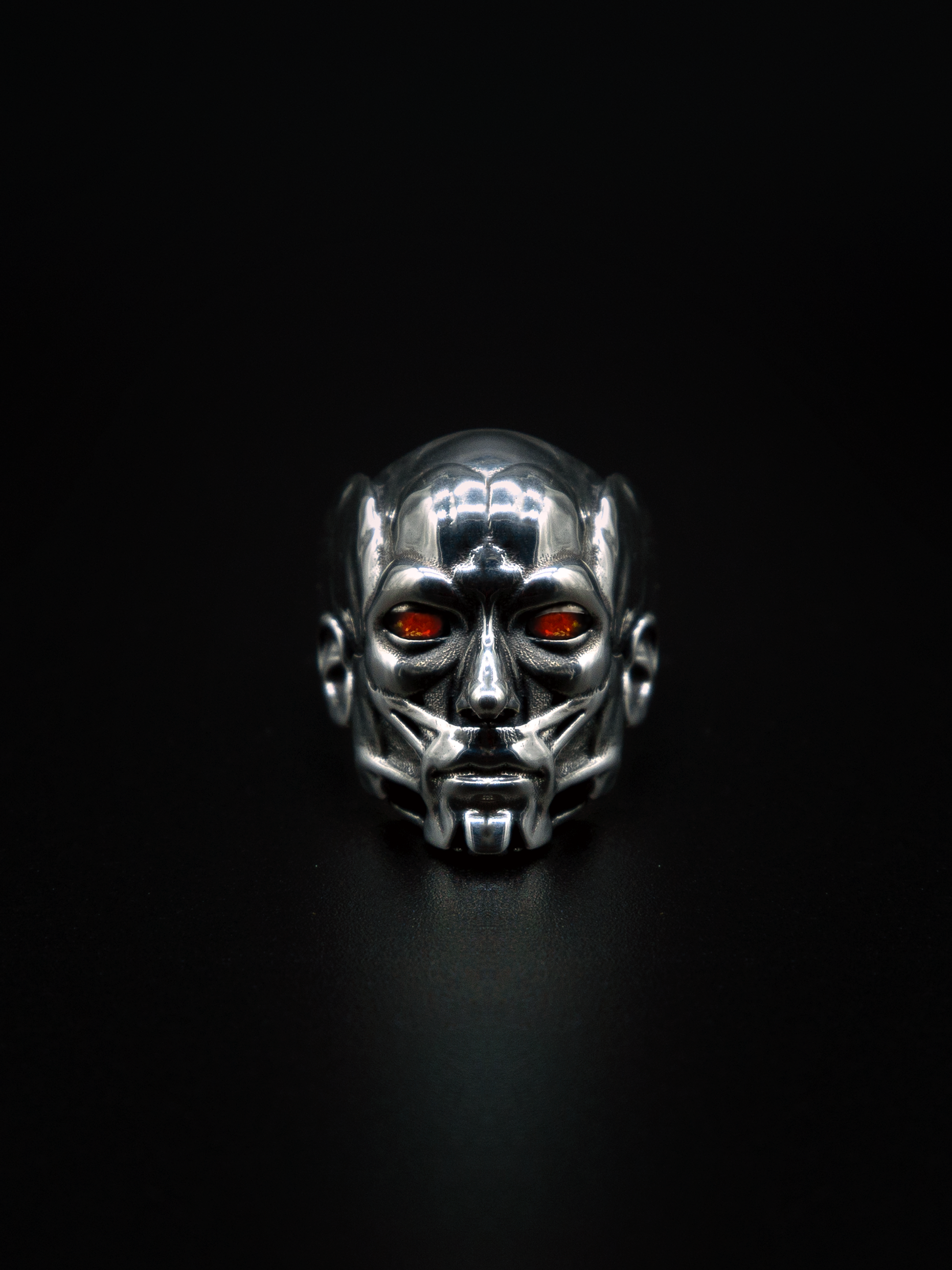 Accuser ring, mens and womens sculpture jewelry, red opals, and moving kinetic