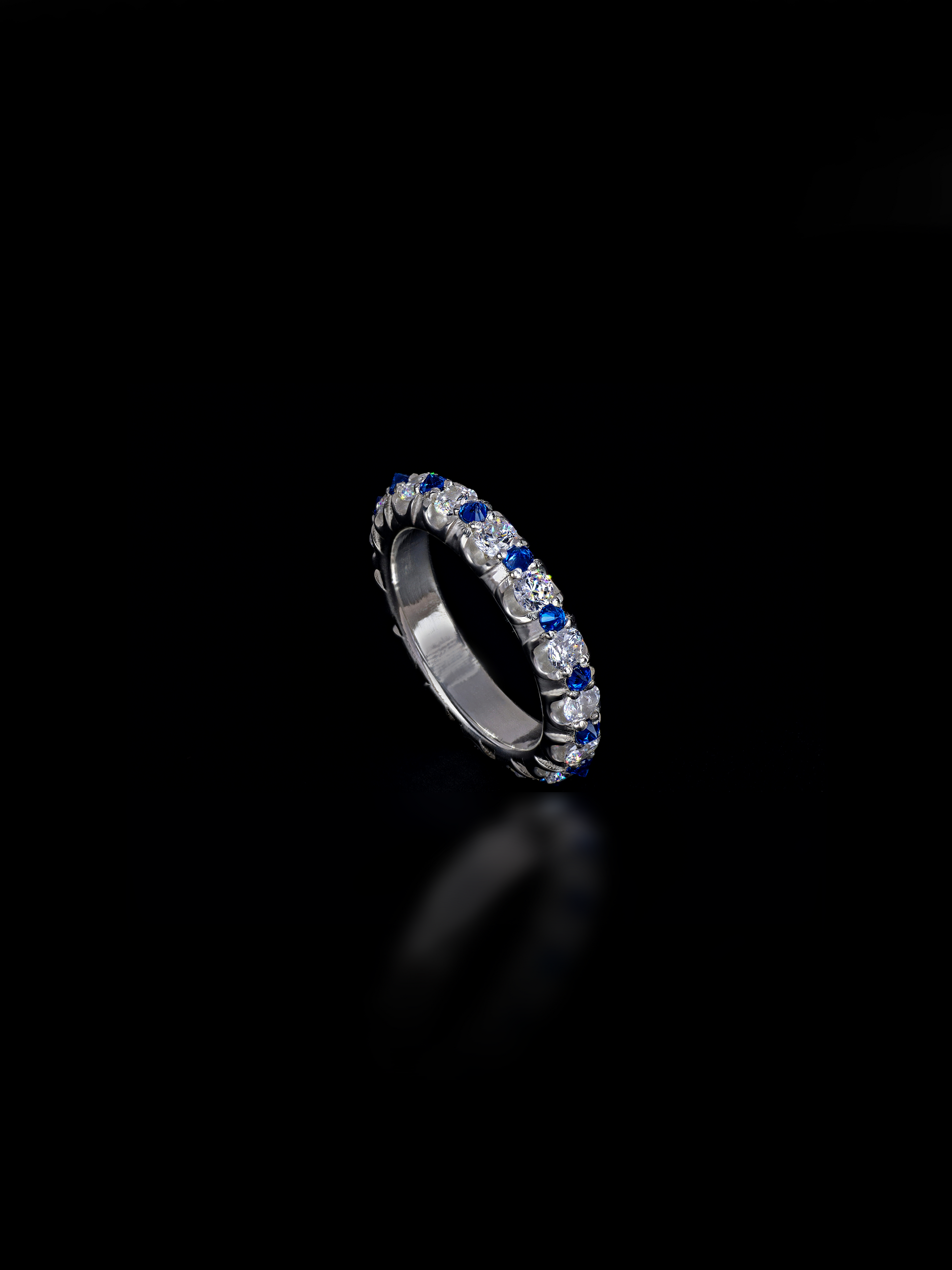 Conversus 925 silver band with upside down set stones and sapphires